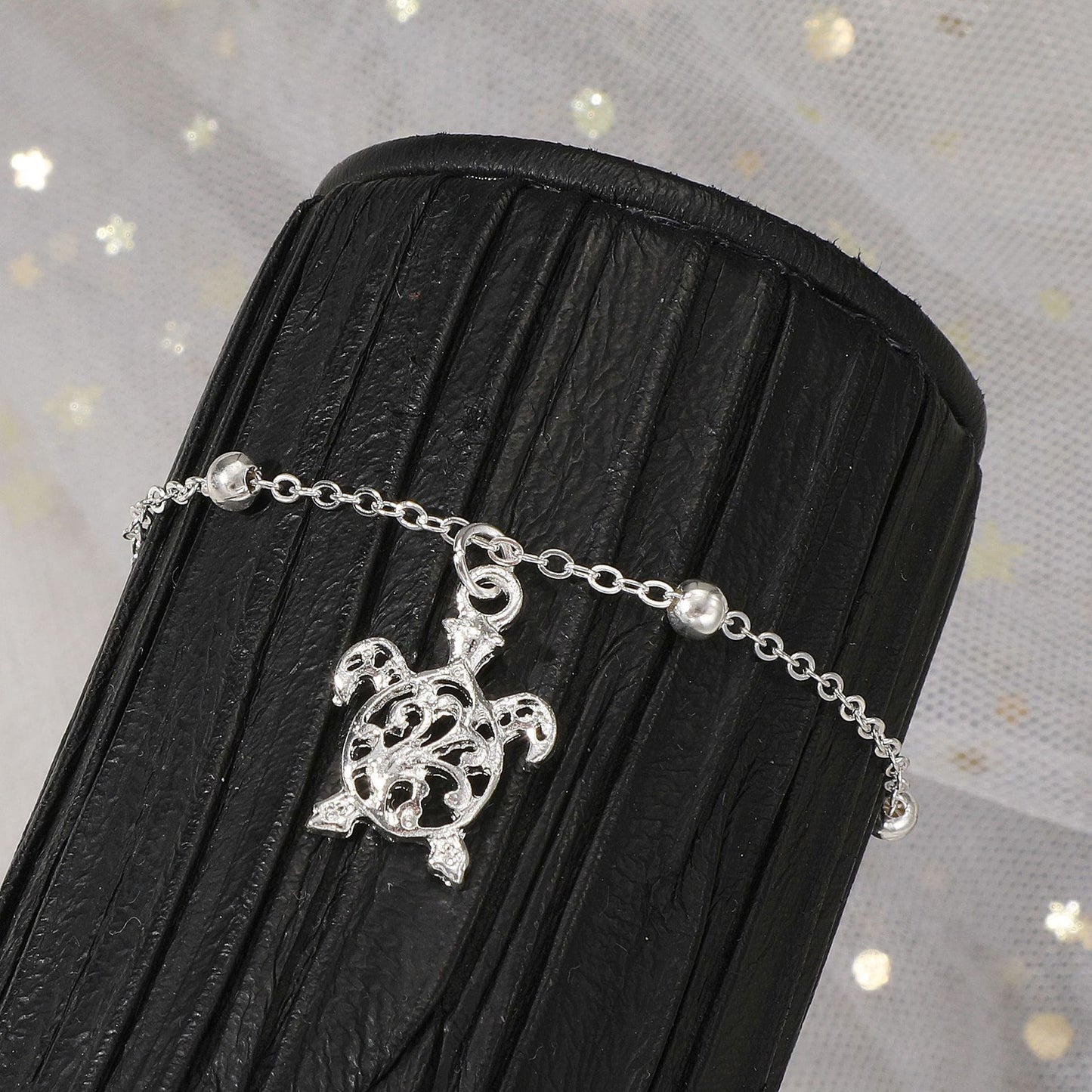 Tobillera Pequeña con Figura de Tortuga de Playa - Elegancia y Estilo Unisex- nexbuy.com.mx