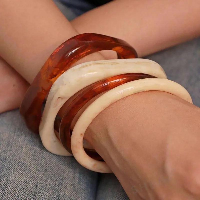 Juego de brazaletes acrílico