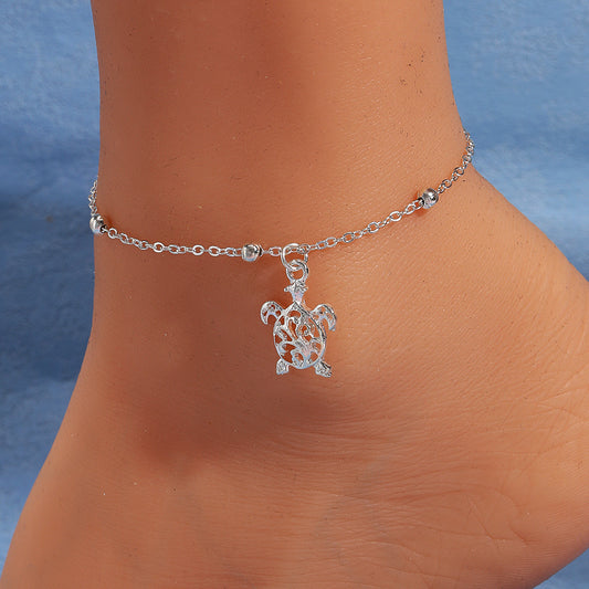Tobillera Pequeña con Figura de Tortuga de Playa - Elegancia y Estilo Unisex- nexbuy.com.mx