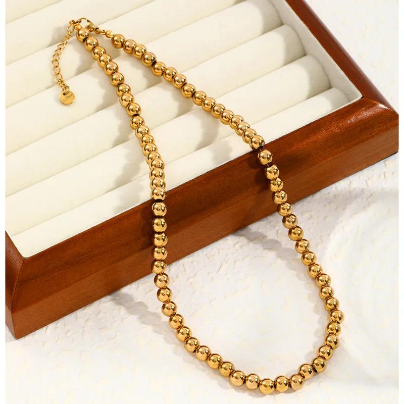 collar colgante perlas doradas